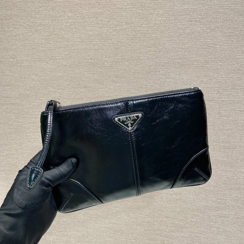 Pra*a clutch bags